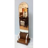 A 1920's Art Deco Cheval mirror, the glass mirror mounted to a mahogany base and back, with