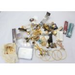 A collection of various costume Jewellery, including bangles, necklaces, brooches, watches and more