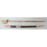 A 20th Century Naval dress sword, the steel blade etched with 'By Warranty' mark and the star of