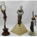 Three reproduction art deco style female figures comprising flapper dancer, 34cm, lady with