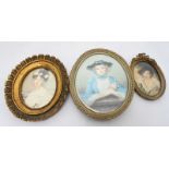 An early 20th century oval portrait miniatures of young lady wearing blue bonnet and dress,