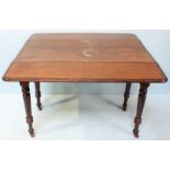 A late 19th century Mahogany Pembroke Table, on shaped and turned supports with castors with one end