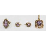 A matched set of 14ct gold and Amethyst Jewellery comprising ring, earrings and necklace with