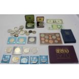 A collection of various proof and circulated coins, including a boxed 1972 commemorative Silver
