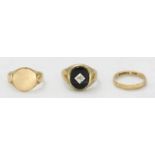 A group of three 9ct gold rings, including a wedding band, signet ring (AF) and another signet