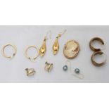 Five pairs of 9ct gold earrings of varying shapes and sizes, including a cameo pair and hoop