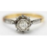 An 18ct gold and platinum illusion set diamond ring, estimated diamond weight 0.15pts, ring size K/