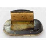 A two-tone horn snuffbox of oval form, together with a large 19th century family bible.