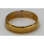 A 22ct gold wedding band, ring size P, approx weight 4.4g