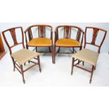 A pair of Edwardian mahogany inlaid tub chairs, together with a pair of Edwardian bedroom chairs.