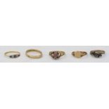 Four various 9ct gold rings, together with an 18ct gold and platinum sapphire and diamond ring.