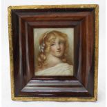 A 19th portrait miniature of a young lady, painted on ivory, signed E.M Brunt to bottom right,