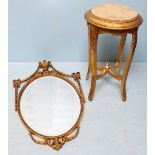 A gilt-wood jardinière stand with circular drop-in marble top and raised on four carved supports,