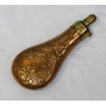 A copper powder flask by G. & J.W. Hawksley, the copper body embossed both sides with scrollwork and