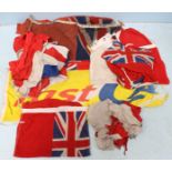 A quantity of assorted Red Ensigns and flags, including one large + six house flags, nine pilot