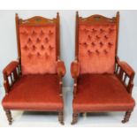 A pair of Victorian walnut parlour armchairs, with pierced and shaped back and arm rests, salmon