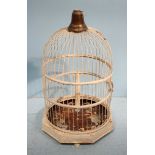 A 20th century off white painted metal "shabby chic" hanging bird cage, the top adorned with a brass