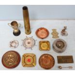 A quantity of naval and marine related metalware including a brass shell case and ashtrays etc.