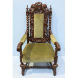 A 19th Century carved and stained oak armchair in the Jacobean style.