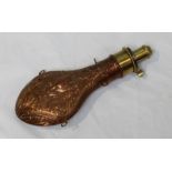 A copper powder flask by Handsome & Co RSTN, the body embossed both sides with hanging game birds,
