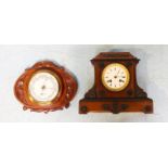 A stained wood mantel clock by 'Chapman,' the white dial with Roman numerals denoting hours and