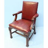 A 20th century mahogany armchair, with ox-blood red, croc-style leather upholstery and brass studded