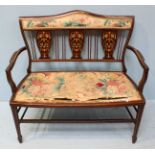 An Edwardian mahogany inlaid two seater parlour sofa, the back and seat with floral, fabric