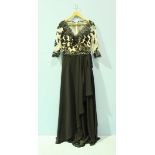 A new and unworn bespoke ladies black and cream full-length satin and beadwork ball gown by 'Vogue,'