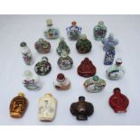 A collection of twenty modern Oriental snuff bottles, including porcelain, lacquer, bone and glass