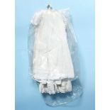 Eleven various vintage linen and lace Christening gowns etc