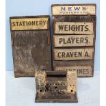 A group of three wooden shop advertising signs from the Portsmouth area, including 'Portsmouth News'