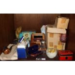 SECTION 45. An assortment of mixed collectables including a travel grooming set, glass paperweights,