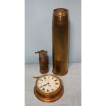 A Smiths Astral brass bulkhead clock, together with a large converted brass shell case and a