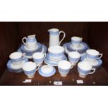 SECTION 39. A Royal Worcester blue, white and gilt decorated tea set comprising of thirty pieces,