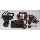 A Zeiss Ikon Contina camera with Novicar-Anastigmat 1:2,8 45mm lense, in original leather case