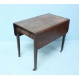 A late 19th century mahogany drop-leaf Pembroke table of rectangular form, with triple-reed edge,