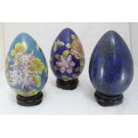 Three modern Chinese large cloisonne eggs, each with hardwood stand and original box (3)