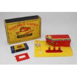 A Matchbox Garage, showroom and service station with no 1 accessory pack comprising Esso pumps and