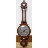 A late 19th century mercury wheel barometer by Hoskin of Ventnor, Isle of Wight, the Persian 'style'