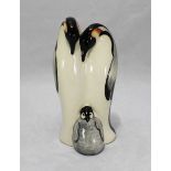 A Moorcroft figural group of a family of three Emperor penguins, designed by Kerry Goodwin, signed