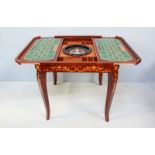 A 20th century Sorrento marquetry inlaid mahogany four-in-one games table, the top lifting off to