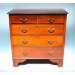 An Edwardian inlaid stained walnut chest of two short, over three long graduated drawers, with brass