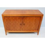 A 1950's sapele mahogany Gordon Russell Helix sideboard, designed by David Booth and Judith