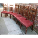 A set of six Victorian walnut parlour chairs, with pierced and shaped backs, salmon pink fabric