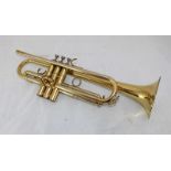 A Selmar B-700 trumpet with detachable bell, various mutes and accessories and housed in original