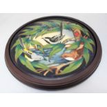 A large Moorcroft pottery charger of three colourful birds perched near the waters edge amidst