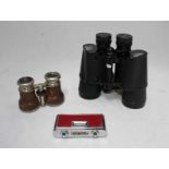 A pair of Charles Frank-Nipole 10x50 Field 5° binoculars, with lense caps and in original case,