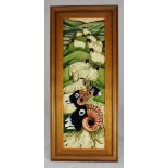 A Moorcroft ceramic plaque "Swaledale Summer" depicting numerous blackface rams grazing among a