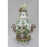 A Chelsea Gold Anchor porcelain vase and cover, the vase of baluster form and profusely decorated