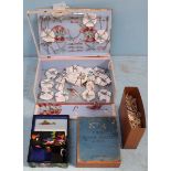 A child's tea set in original box, together with an Oriental lacquered musical trinket box,